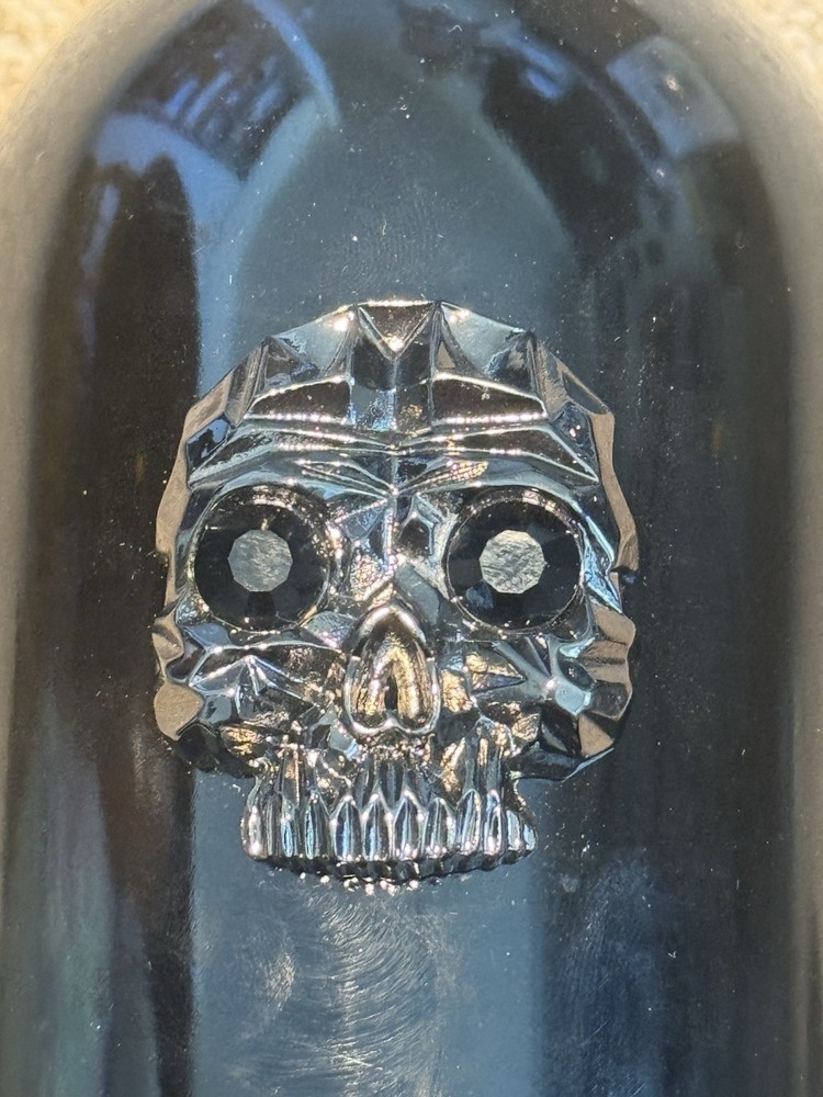 Rare empty bottle of wine The Resurrection (Napa Valley) with a skull
