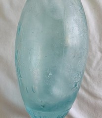 antique torpedo bottles