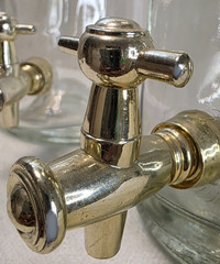 Large Clear Glass Bottle with Cork Stopper And Gold Faucet Used