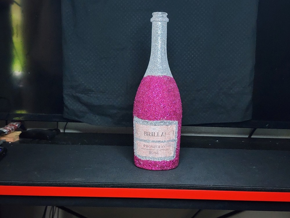 Festive Holiday Sparkling Wine Empty Bottle: Fuzzy Textured Hot Pink Color