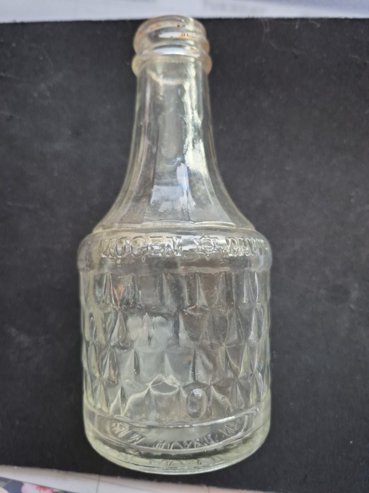 1961 Mogen David Wine Bottle 4 oz with Star of Dvid On Bottle