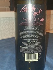 Marilyn Monroe Merlot wine bottle, adorned with beaded bottle cover.