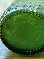 Vgt Green Glass Wine Bottle With Embossed Grape Designs, 11” Tall