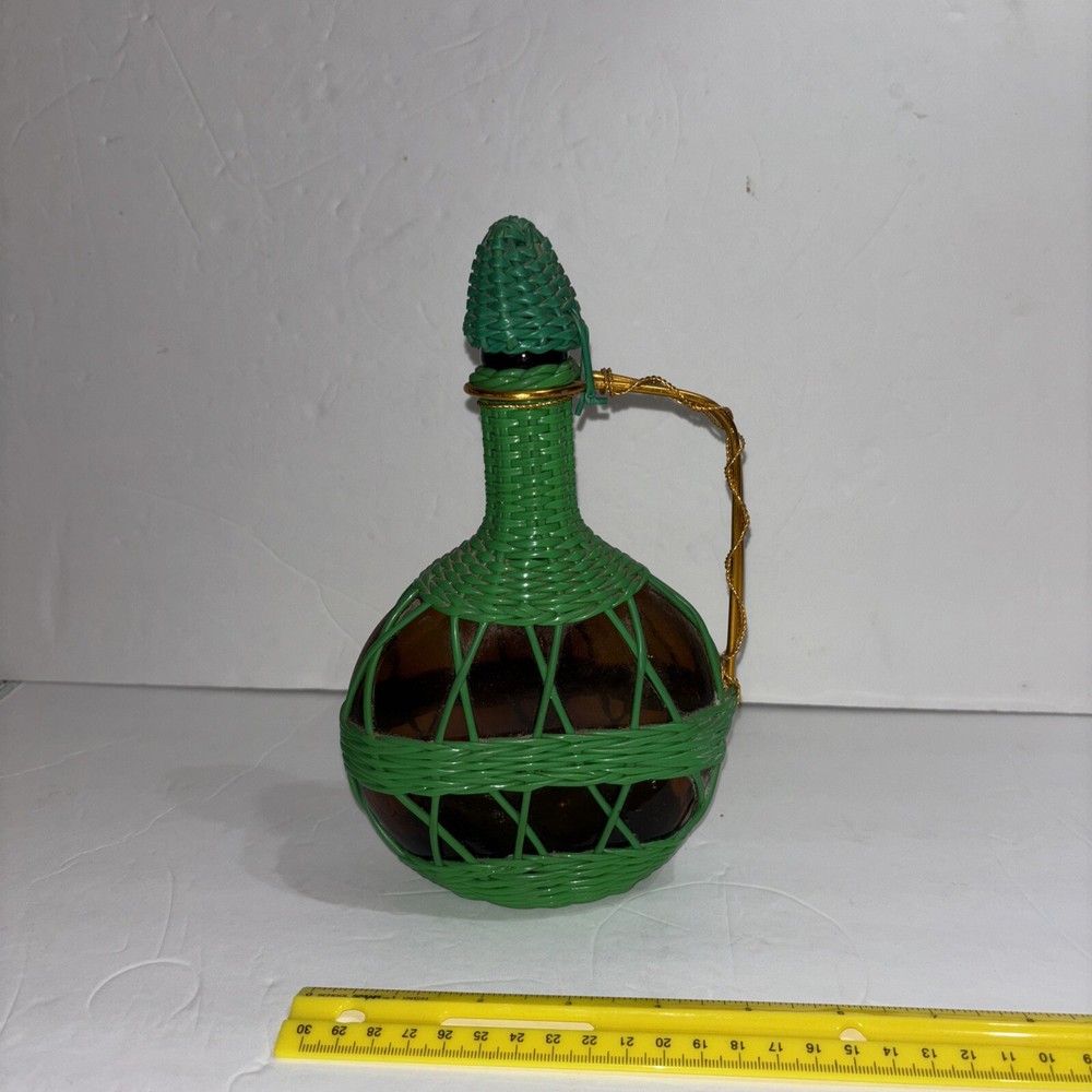 MCM Viresa Plastic Scoubidou Woven Wicker Wine Bottle Jug Metal Handle Green