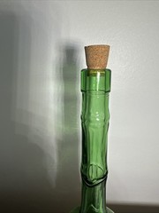Vintage Glass, Long Neck, Green Bottle With Wickard Base 10 Inches Tall. Nice