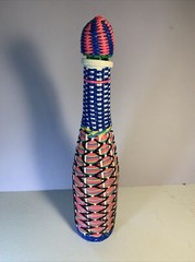 Vintage Woven Plastic Wine Bottle Art with Lid Spain 15&Prime; Tall Retro
