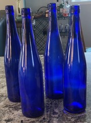Lot of 4 Cobalt Blue Glass Wine Bottles