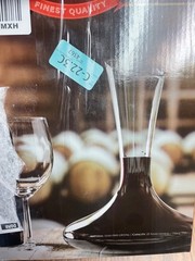 Le Portteus Asymetrical spout and wide base wine glass amd bottle