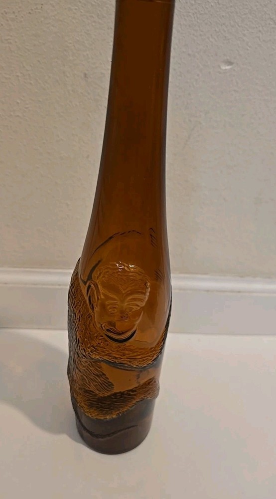 Beautiful Vintage Amber Glass Wine Bottle with Embossed Monkey 14in x 2.75in