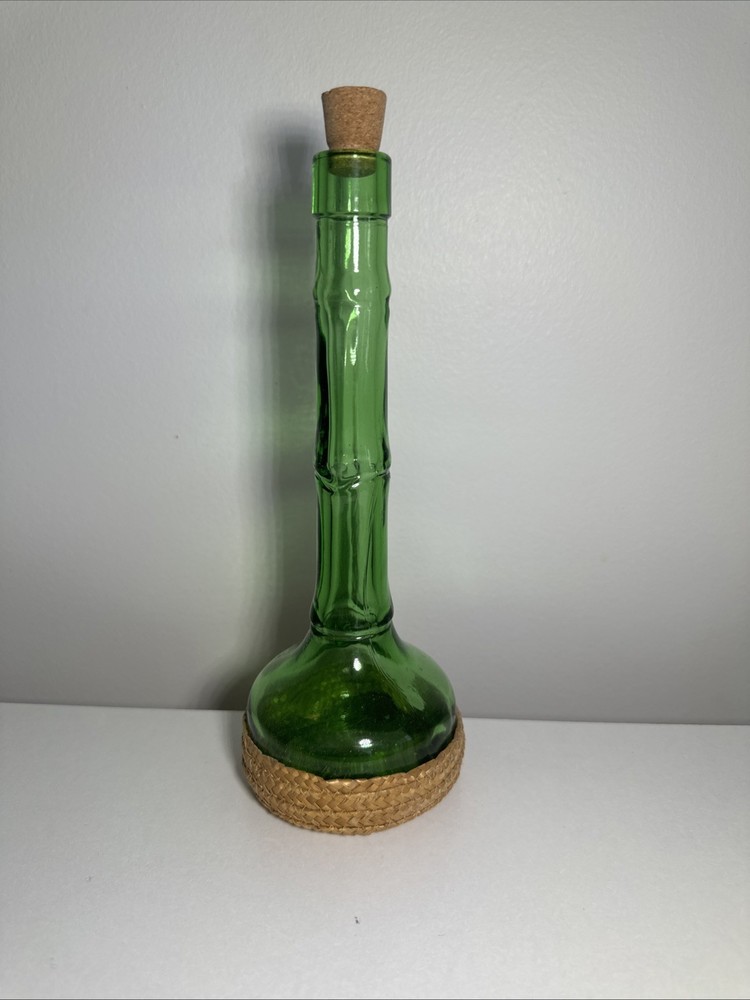 Vintage Glass, Long Neck, Green Bottle With Wickard Base 10 Inches Tall. Nice