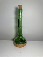 Vintage Glass, Long Neck, Green Bottle With Wickard Base 10 Inches Tall. Nice