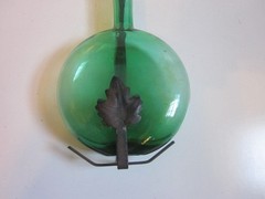 Vintage Green blown Glass 9.5&Prime; WINE Bottle W/13&Prime; WROUGHT IRON LEAF DESIGN