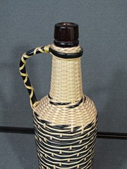 Vintage 70s Plastic Tube Weave Black & White Glass Bottle