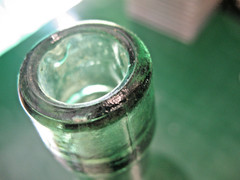 GREEN DEPOSITATO WINE BOTTLE DAMSEL HIPPED RIPPLE GLASS ROUND BOTTOM