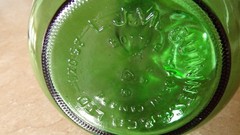 Vintage L.J. McGuinness co. Green wine bottle made in Canada 9&Prime; tall