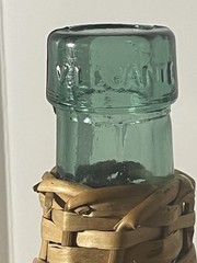 Vintage V. Levante Spanish wicker covered green glass demijohn bottle See Pics