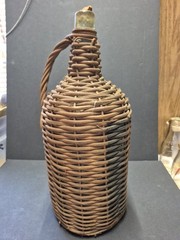 Vintage Rustic Large Wicker Demijohn 16” Green Bottle W/ Partial Cork.