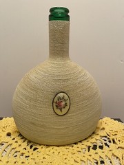 Twine Wrapped Liquor Bottle W/ Floral Medallion Rare Green Glass MCM Bar Decor