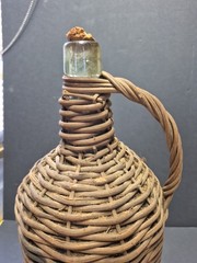 Vintage Rustic Large Wicker Demijohn 16” Green Bottle W/ Partial Cork.