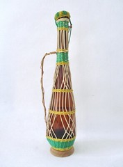 Vtg MCM Tall Brown EMPTY Wine Bottle Wicker Cover Metal Handle Wood Base Stopper