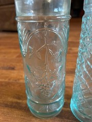Vintage Embossed Glass Bottles – Set of 2