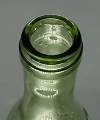 Vintage Green grape embossed 25 oz capacity height 11 in bottle