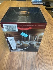 Le Portteus Asymetrical spout and wide base wine glass amd bottle
