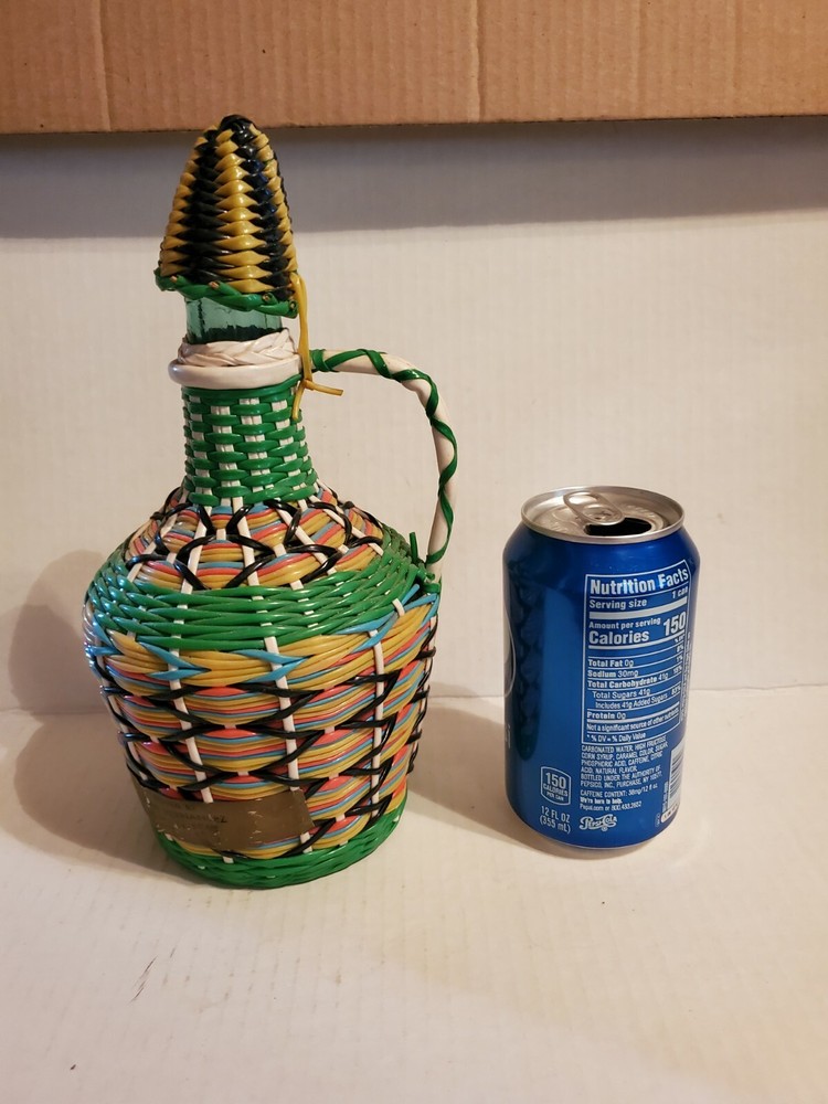Vintage Plastic Wicker Wrapped Glass Bottle Decanter Woven Spanish Burgundy 1959