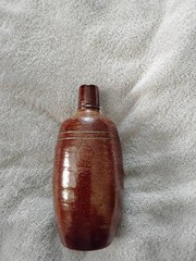 VINTAGE BROWN STONEWARE BOTTLE,PRODUCED IN PORTUGAL BY MAREIA FONSECA PORT WINE,