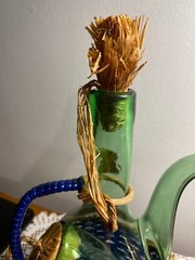 1963 Chianti Italian Wine Green Glass Decanter & Blue Wicker Basket w/labels.