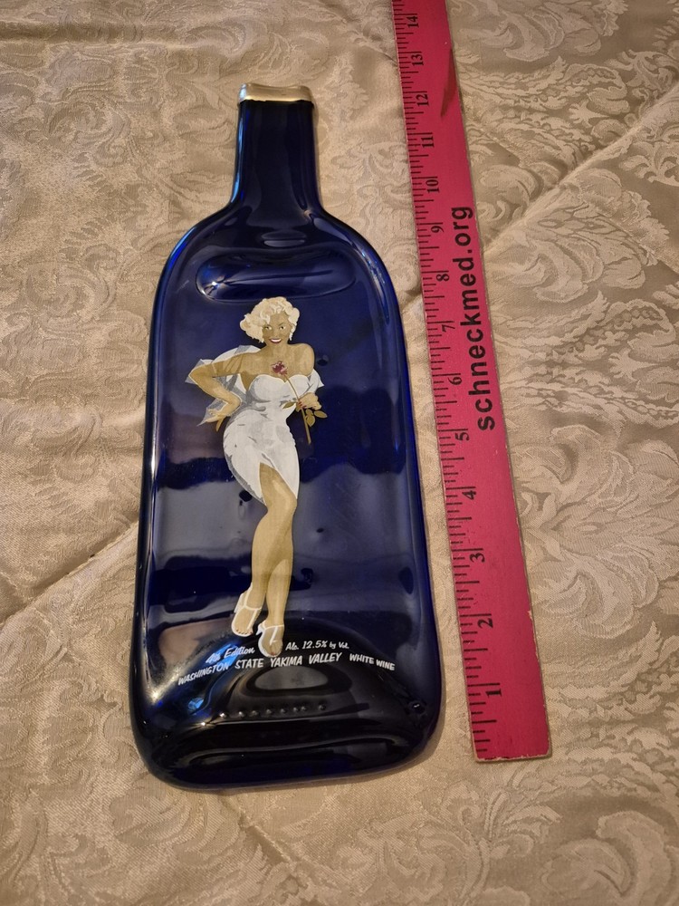 MARILYN MONROE KESTREL VINTNERS PURE PLATINUM WINE BOTTLE, EMPTY, MELTED