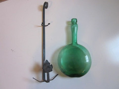 Vintage Green blown Glass 9.5&Prime; WINE Bottle W/13&Prime; WROUGHT IRON LEAF DESIGN