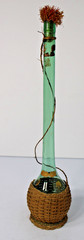 Vintage 21&Prime;H Green Glass Demijohn Carafe in Raffia, New Orleans Import Label