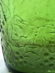 Vgt Green Glass Wine Bottle With Embossed Grape Designs, 11” Tall