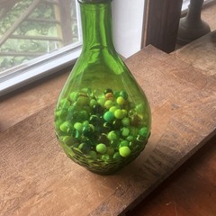 Green Glass Wine Bottle with Cap, Filled with Assorted vintage Marbles Inside