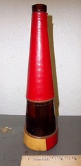 Vintage unusual bottle with leather covering, cool collectible, 11 x 3 inches