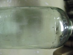 ANTIQUE WINE / LIQUOR BOTTLE BLOWN / SPUN APPLIED TOP AQUA GLASS