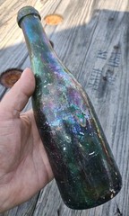 Antique Unbranded Wine Bottle With Iridescent Colored Patina Collectible