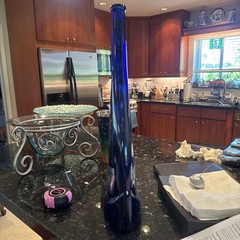 Empty Colbalt blue Incanto Wine bottle