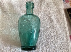 Vintage 6” Wine Bottle Grape Design With Heart ..Cantine Vaseline..Teal Blue