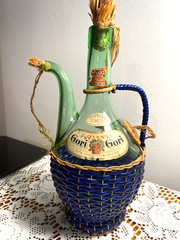 1963 Chianti Italian Wine Green Glass Decanter & Blue Wicker Basket w/labels.