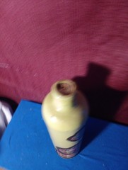 Item # 24 Stoneware Vintage Wine Bottle Pale Yellow