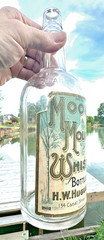 RARE ANTIQUE ORIGINAL  » MOON MOUNTAIN WHISKEY  » PAPER LABEL EMPTY BOTTLE ! NICE