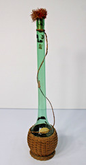 Vintage 21&Prime;H Green Glass Demijohn Carafe in Raffia, New Orleans Import Label