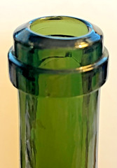 Pre 1860 dark green champagne bottle with kick up bottom