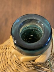 V. Levante Vintage Spanish Wicker-Covered Green Glass Demijohn Bottle