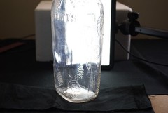 Vintage Garrett&rsquo;s American Wines embossed clear 1 quart wine bottle grapes