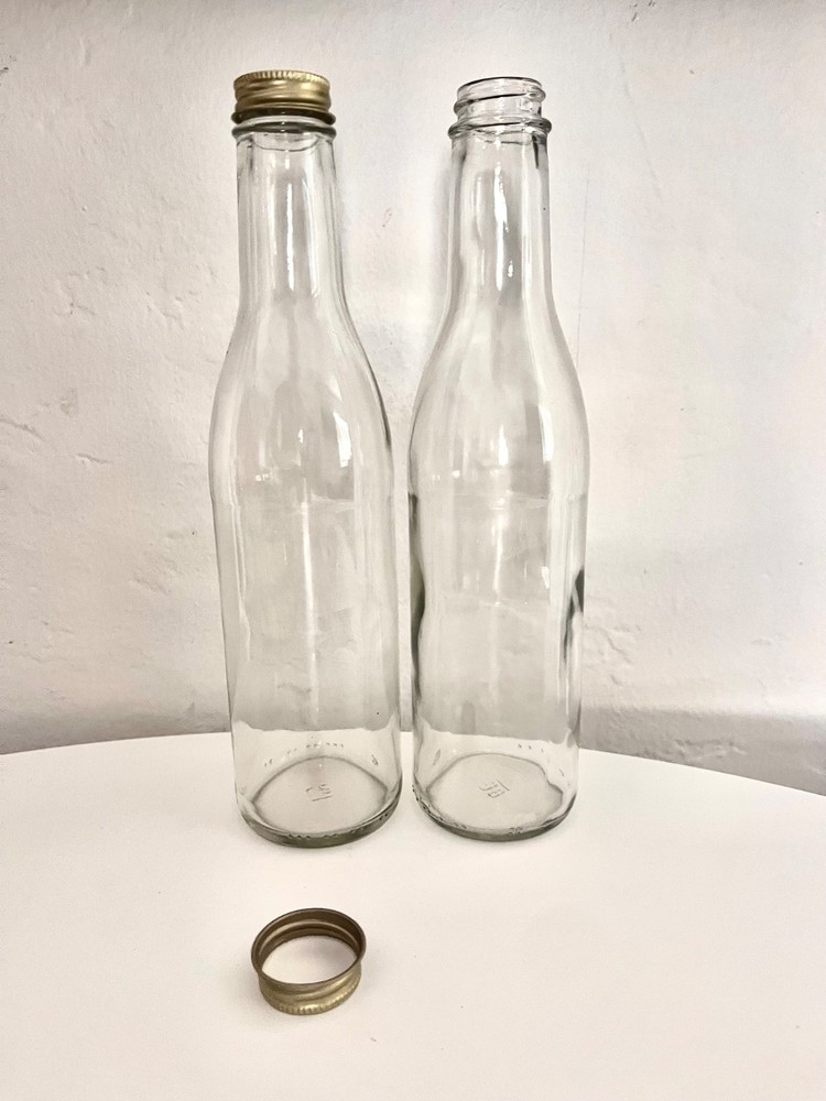 Wholesale 12 oz clear glass woozy bottles 1200 per pallet (12 pack cases)