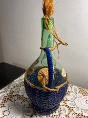 1963 Chianti Italian Wine Green Glass Decanter & Blue Wicker Basket w/labels.