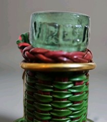 Vintage Green Viresa Glass Bottle Wrapped In Colorful Plastic Wicker 9.5” Tall